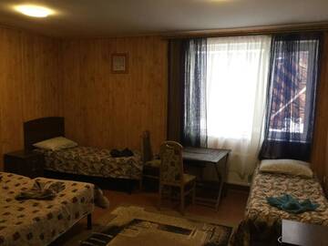 Фото номера Четырехместный номер с общей ванной комнатой Отель Hotel Fortetsya г. Славское 3