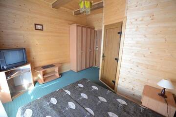 Фото номера Двухместный номер Делюкс с 1 кроватью или 2 отдельными кроватями Загородные дома Cottage Kurshevel г. Славское 9