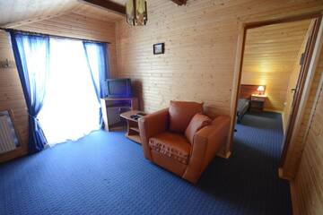 Фото номера Люкс с видом на горы Загородные дома Cottage Kurshevel г. Славское 5
