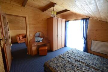 Фото номера Люкс с видом на горы Загородные дома Cottage Kurshevel г. Славское 4
