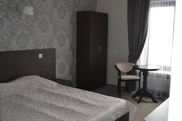Фото номера Стандартный двухместный номер с 1 кроватью Отель Гостиничный комплекс Двор Княжей Короны г. Славское 4