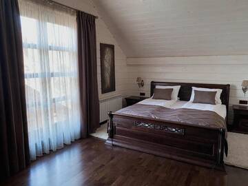 Фото номера Вилла с 2 спальнями Виллы Hostynnyy Dvir Apartament Hotel г. Славское 12