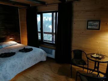 Фото номера Двухместный номер Делюкс с 1 кроватью Отель AGORA Chalet г. Славское 5