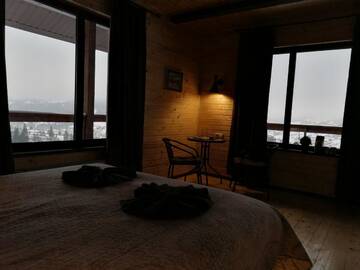 Фото номера Двухместный номер Делюкс с 1 кроватью Отель AGORA Chalet г. Славское 8
