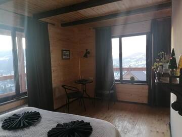 Фото номера Двухместный номер Делюкс с 1 кроватью Отель AGORA Chalet г. Славское 15